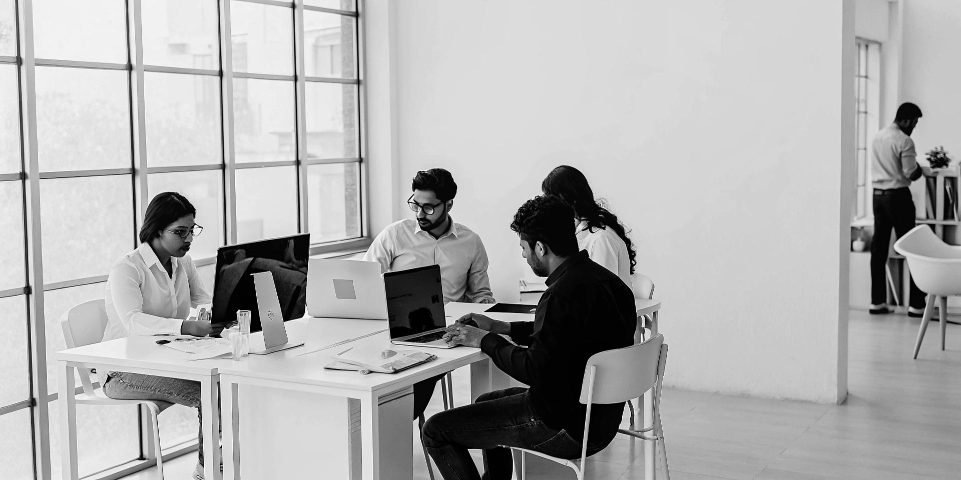 PaydAds team working in the office